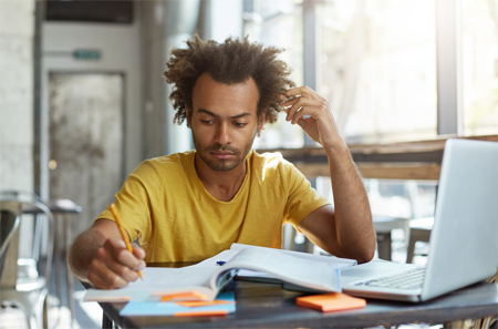 Man Studying Online